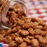 Delicious coconut-coffee candied peanuts in a bowl, a perfect snack treat.